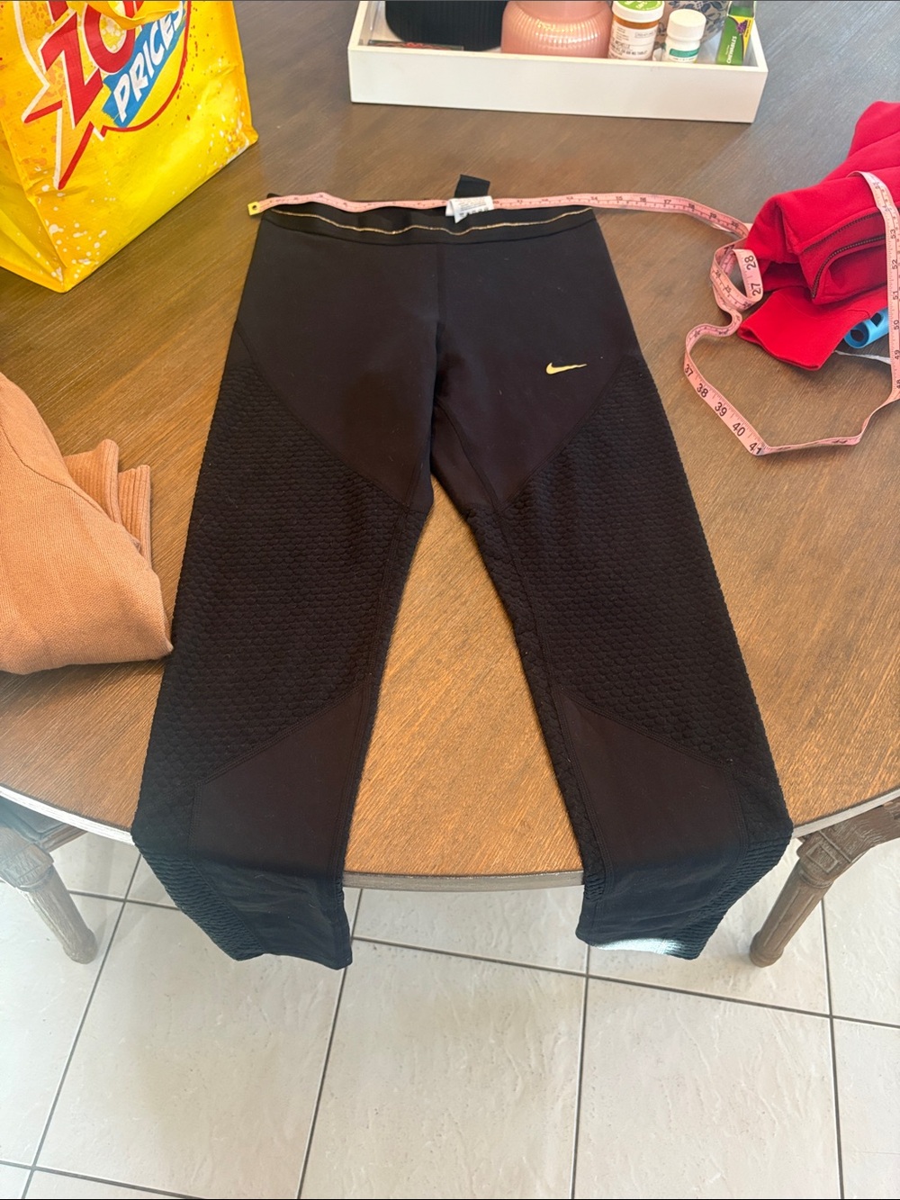 Nike Black Girls' Athletic Leggings with Gold Swoosh fleece inside. Medium